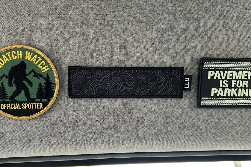 3 patches on the headliner of a car