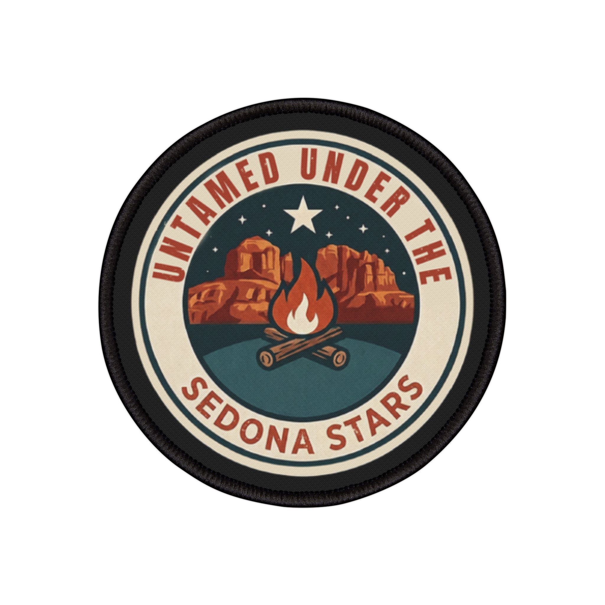Round patch with desert landscape, stars, and campfire design on a white background