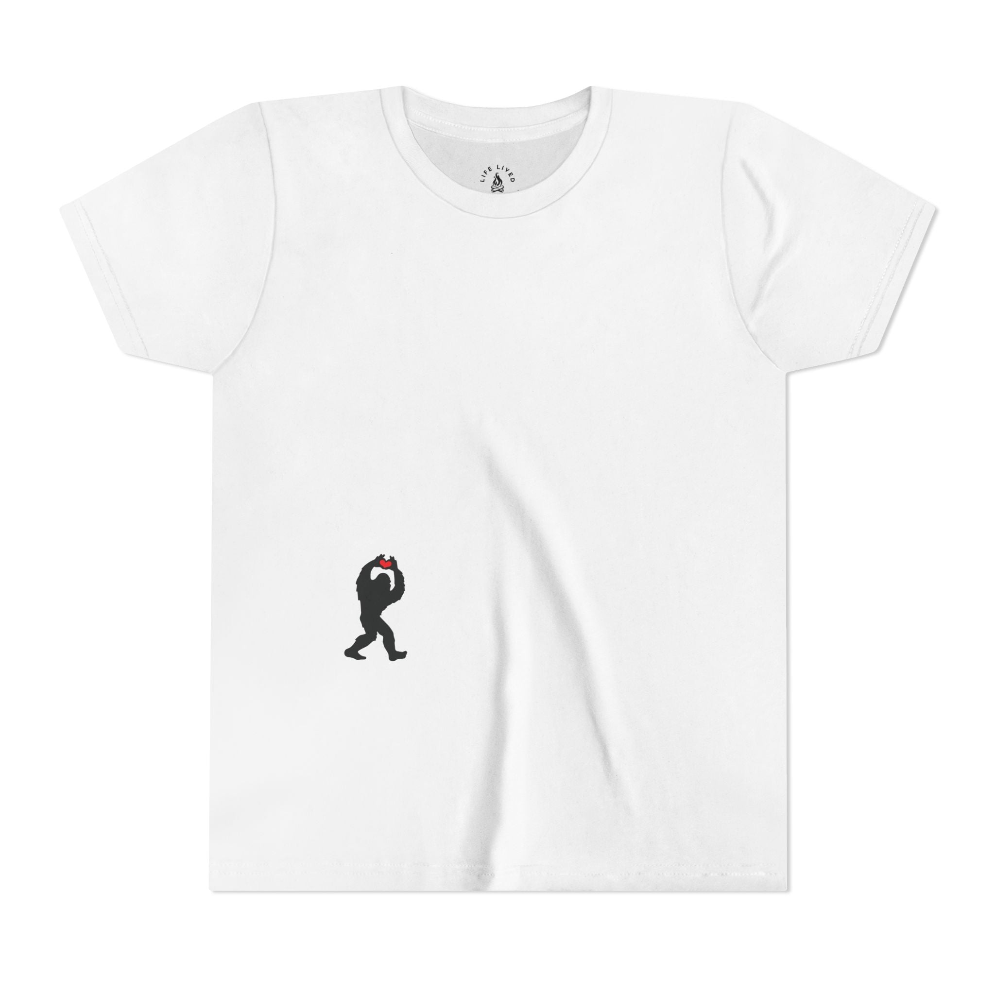 White t-shirt with small black Sasquatch graphic on lower front on a white background