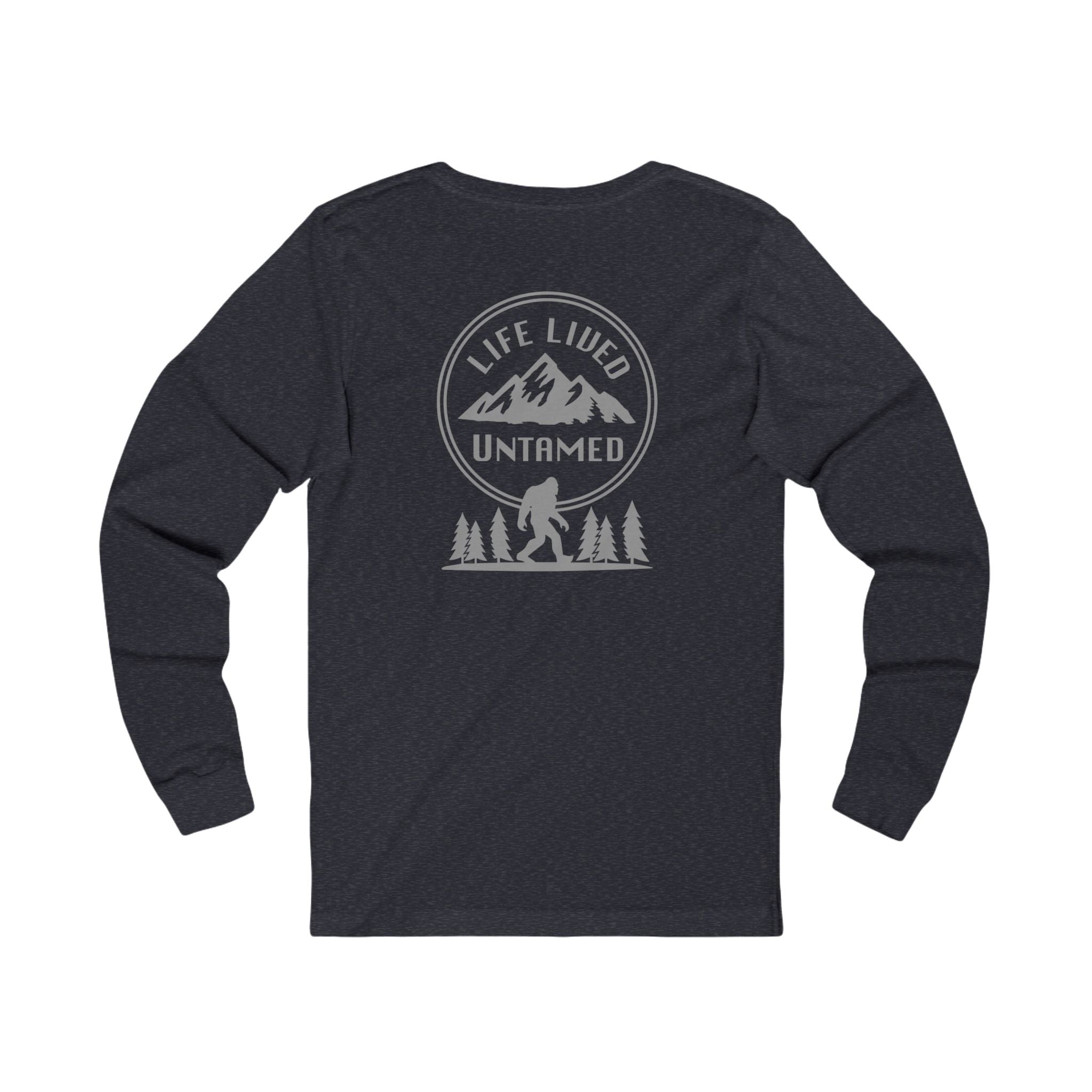 Heather Navy long-sleeve shirt with a black graphic design on the back featuring mountains, trees, and a silhouette of a Sasquatch against a white background