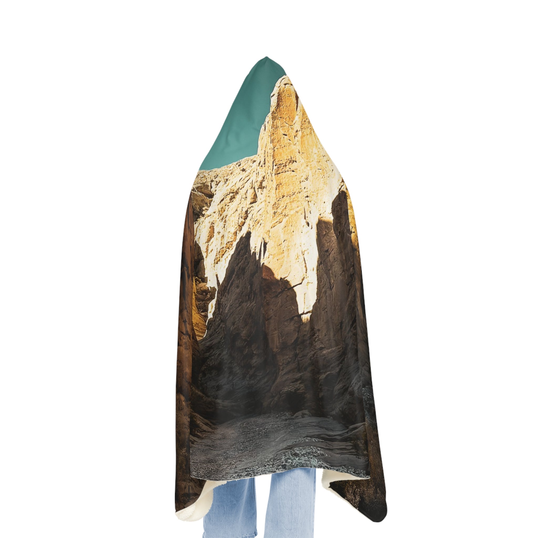 Scarf with mountain design worn by a person on a white background