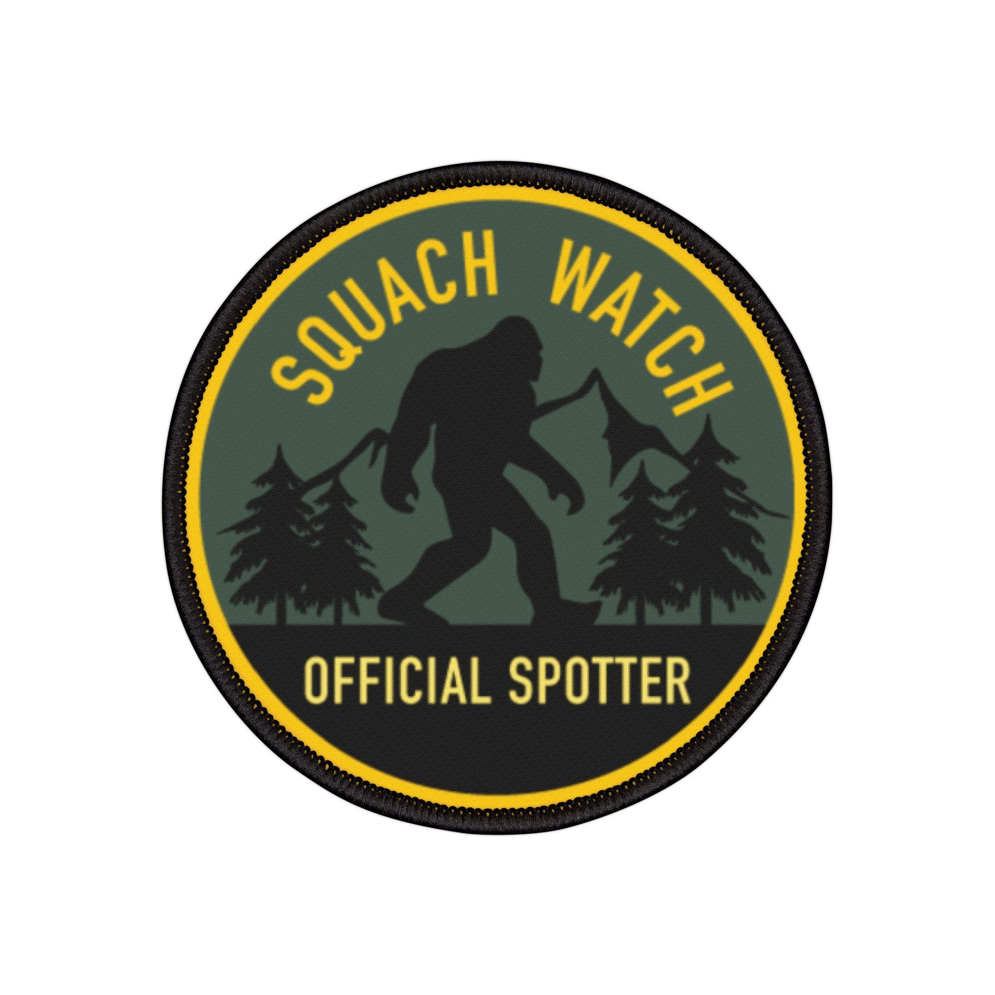 Squatch Watch Official Spotter patch with silhouette of a bigfoot and trees on a green background.