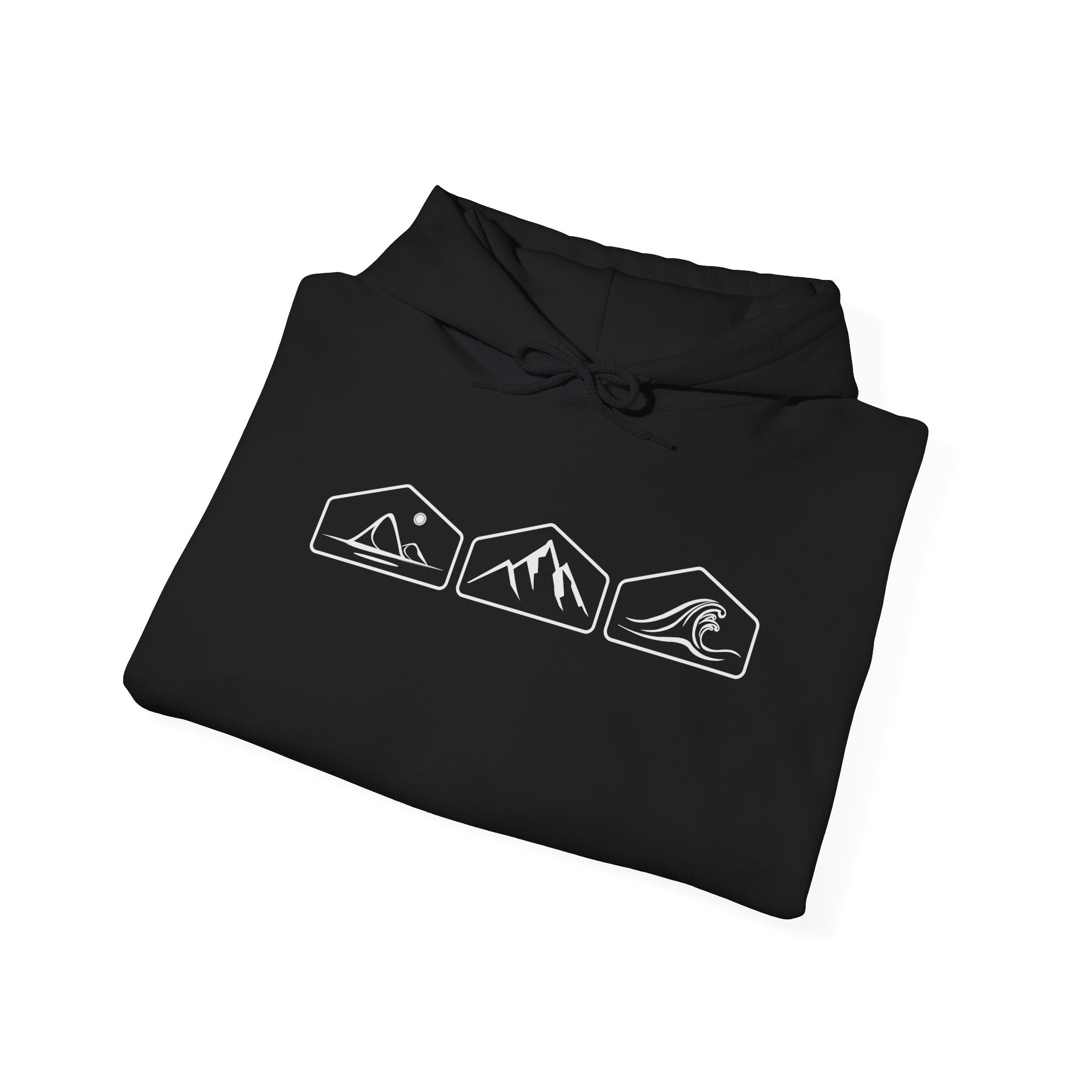 A folded black hoodie with white mountain, desert and wave design on a white background.