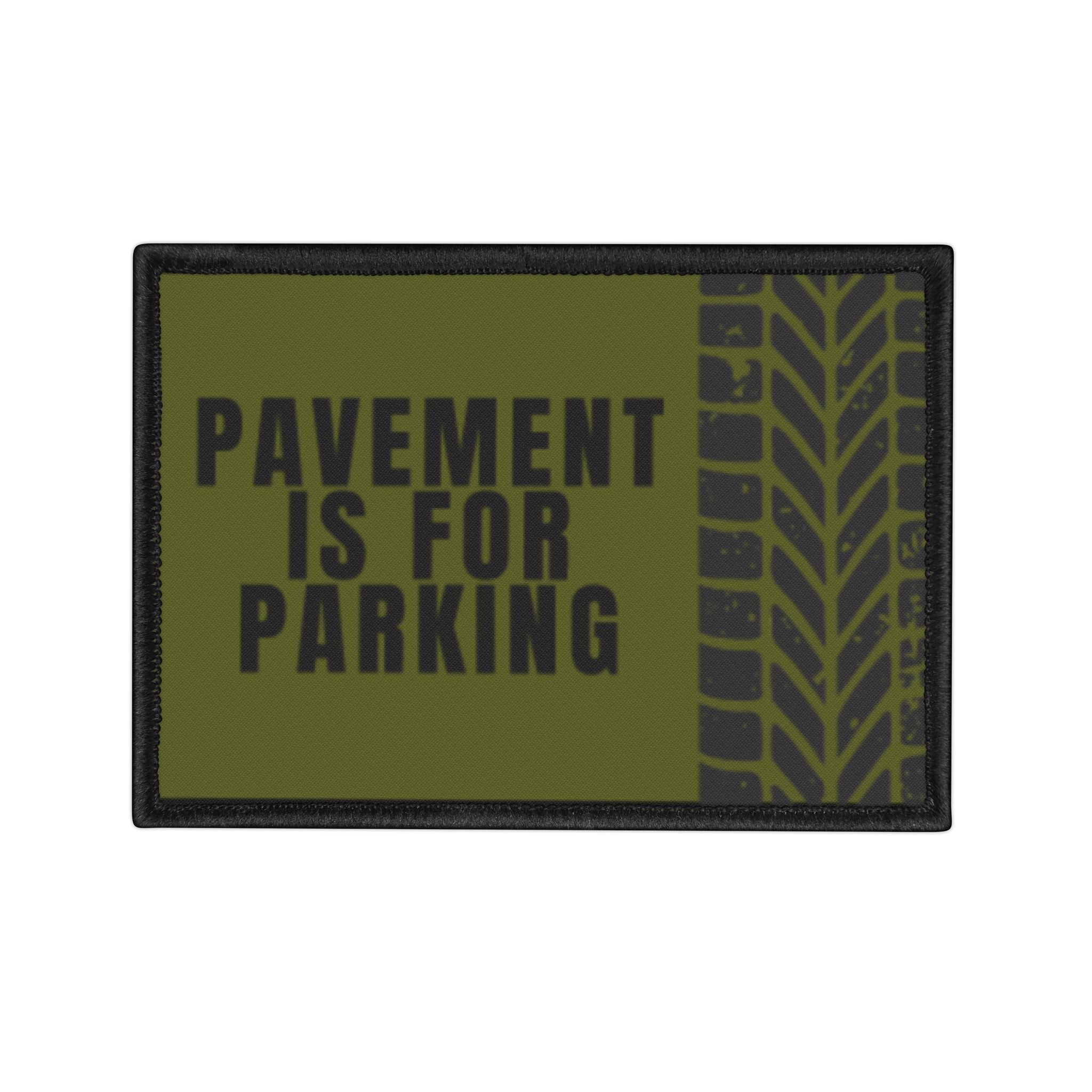 Patch with 'Pavement is for Parking' text and tire tread design on a green background