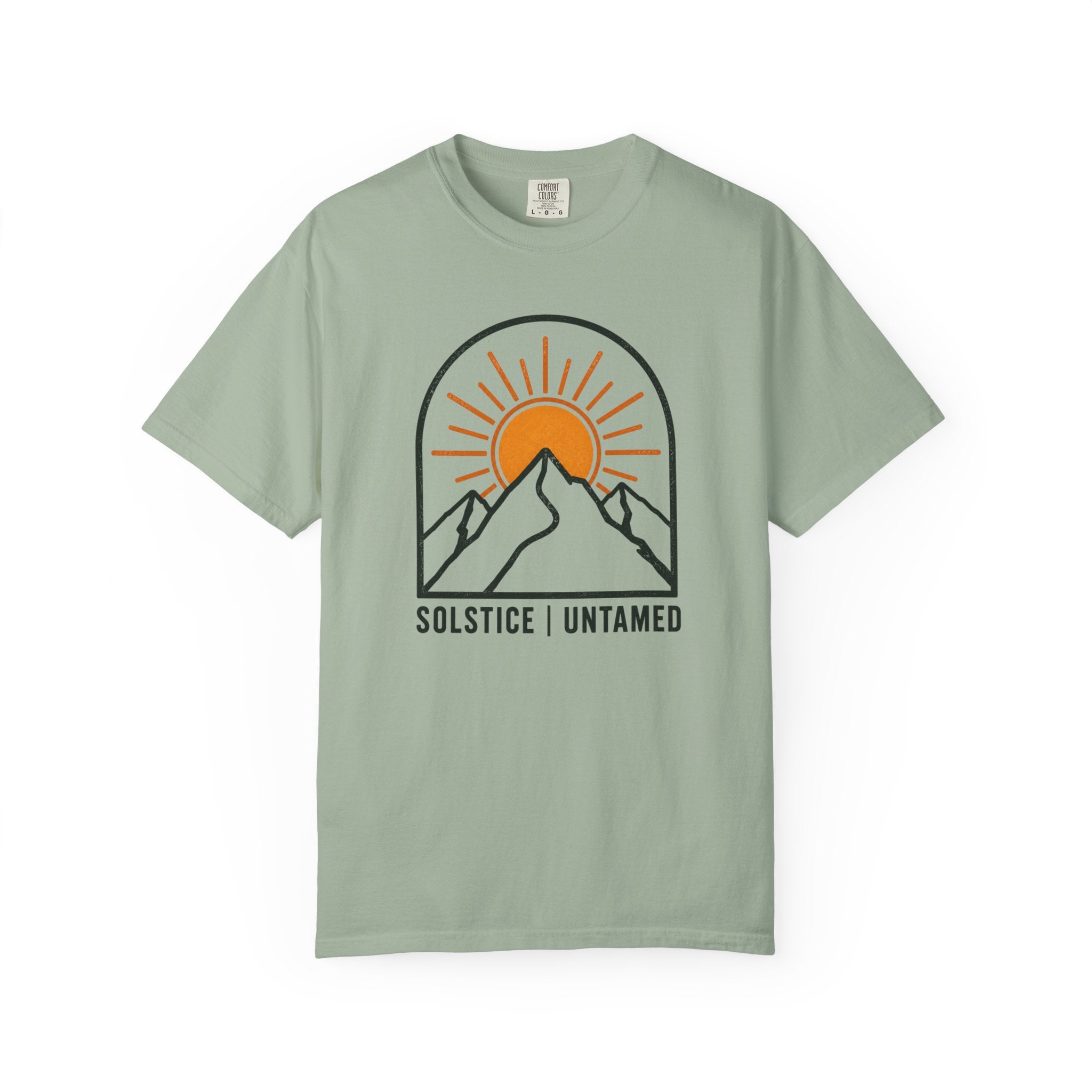Bay green t-shirt with mountain and sun design on a white background