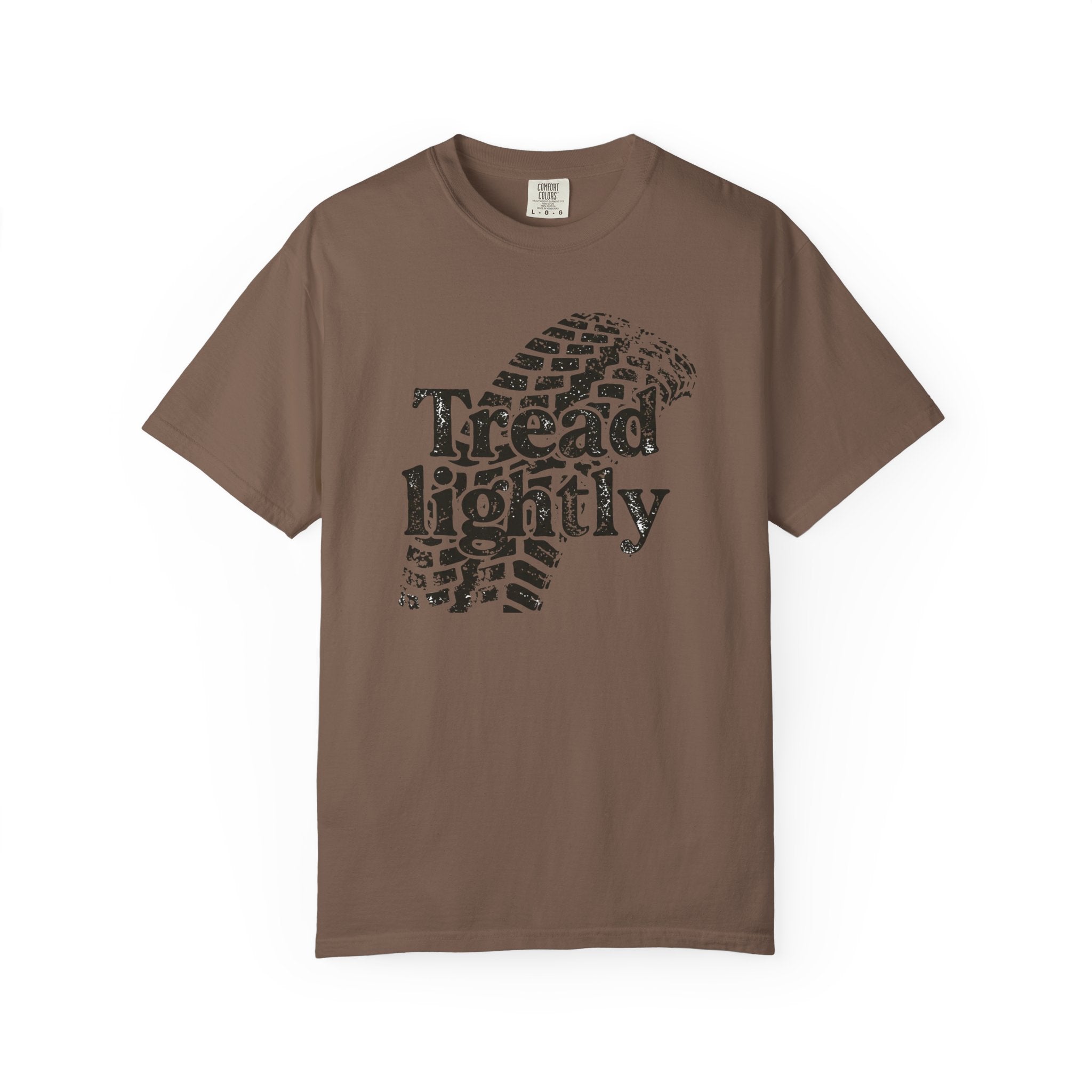 Brown t-shirt with 'Tread Lightly' graphic on a white background