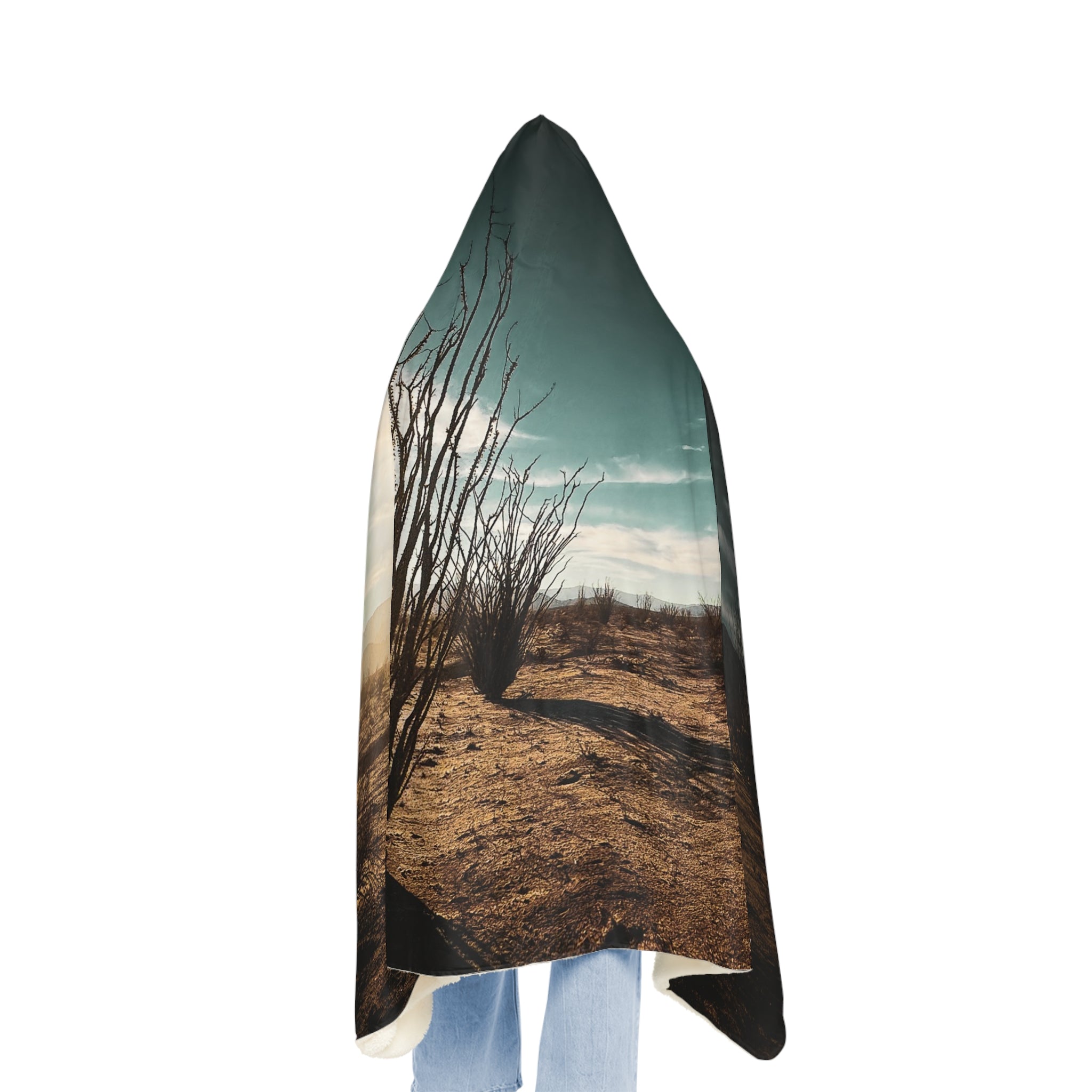 Back side of desert landscape design worn by a person on a white background