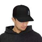 Man wearing a black campfire logo on a cap against a white background