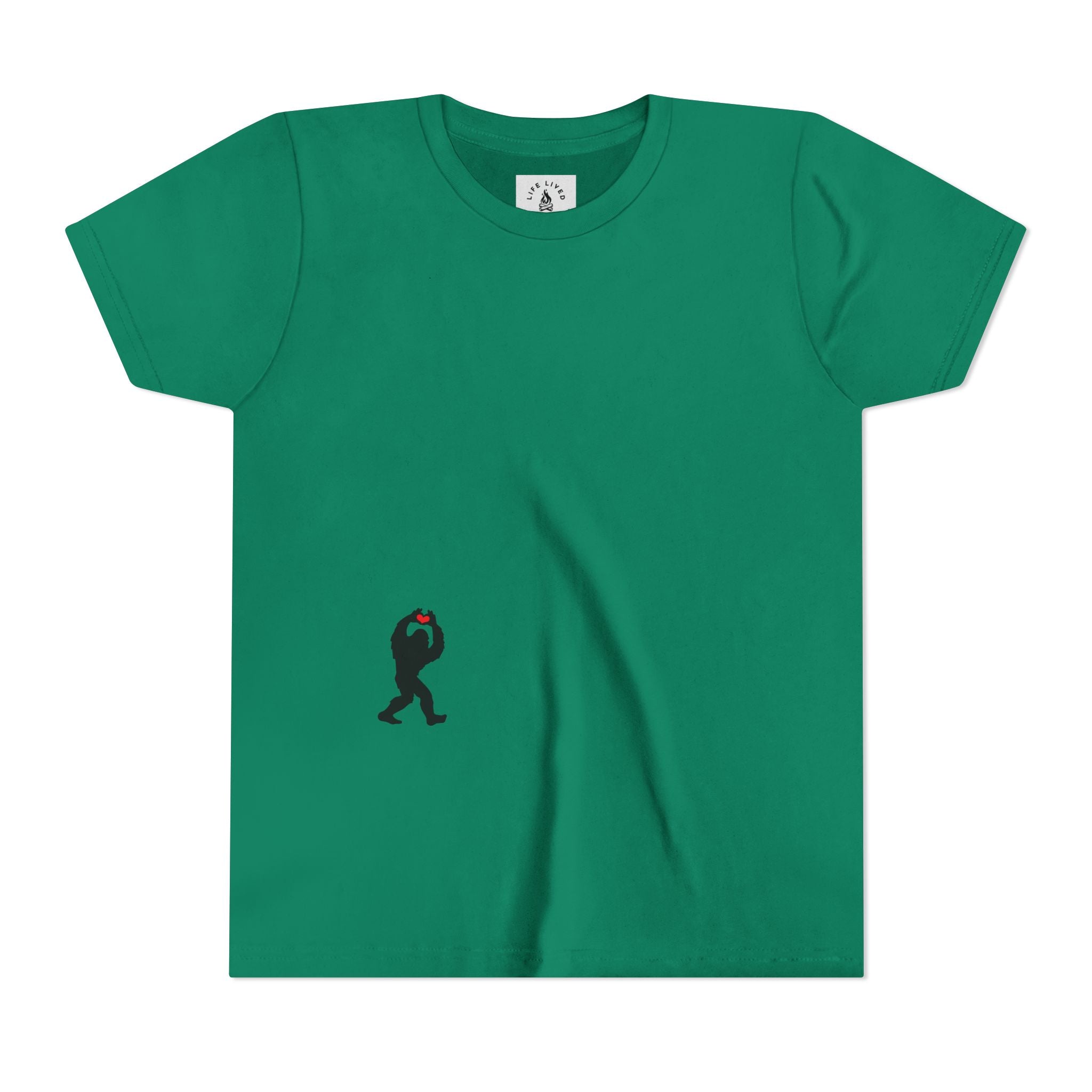 Kelly Green t-shirt with small black Sasquatch graphic on lower front on a white background