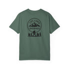Bue spruce t-shirt with a black graphic design on the back featuring mountains, trees, and a silhouette of a Sasquatch
