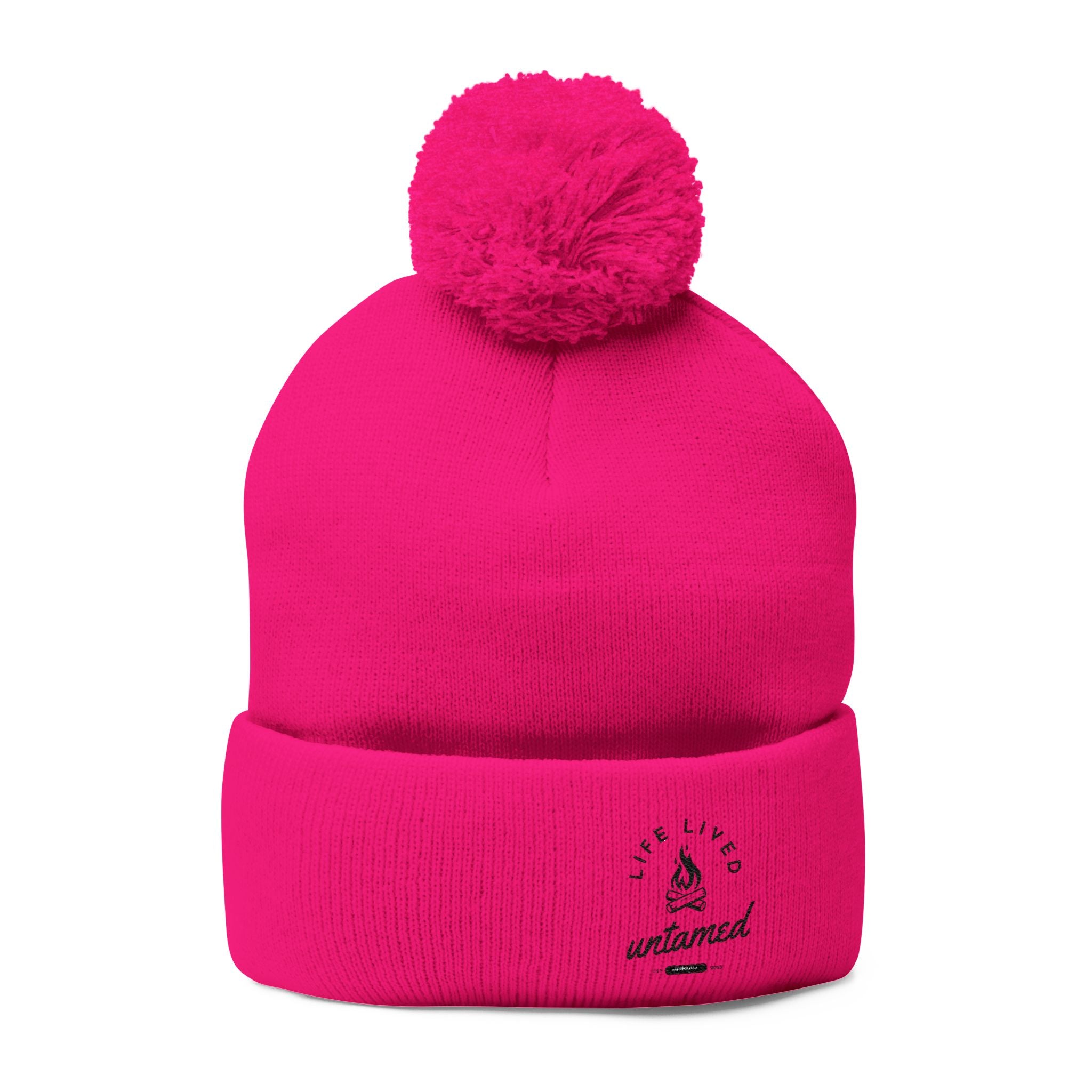 Neon pink beanie with a pom-pom at the top