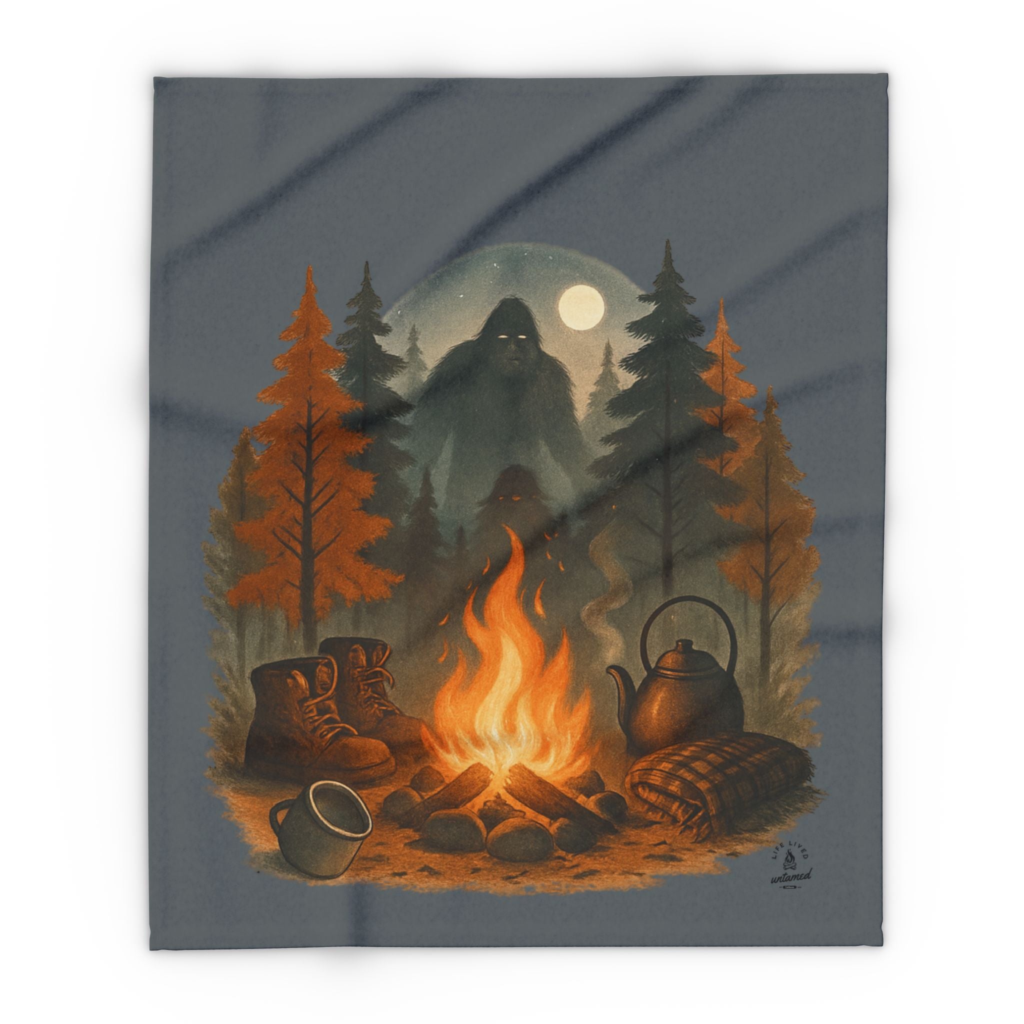 Blanket offers illustration of a campfire with a teapot, mug, and boots in a forest with a moonlit sky.
