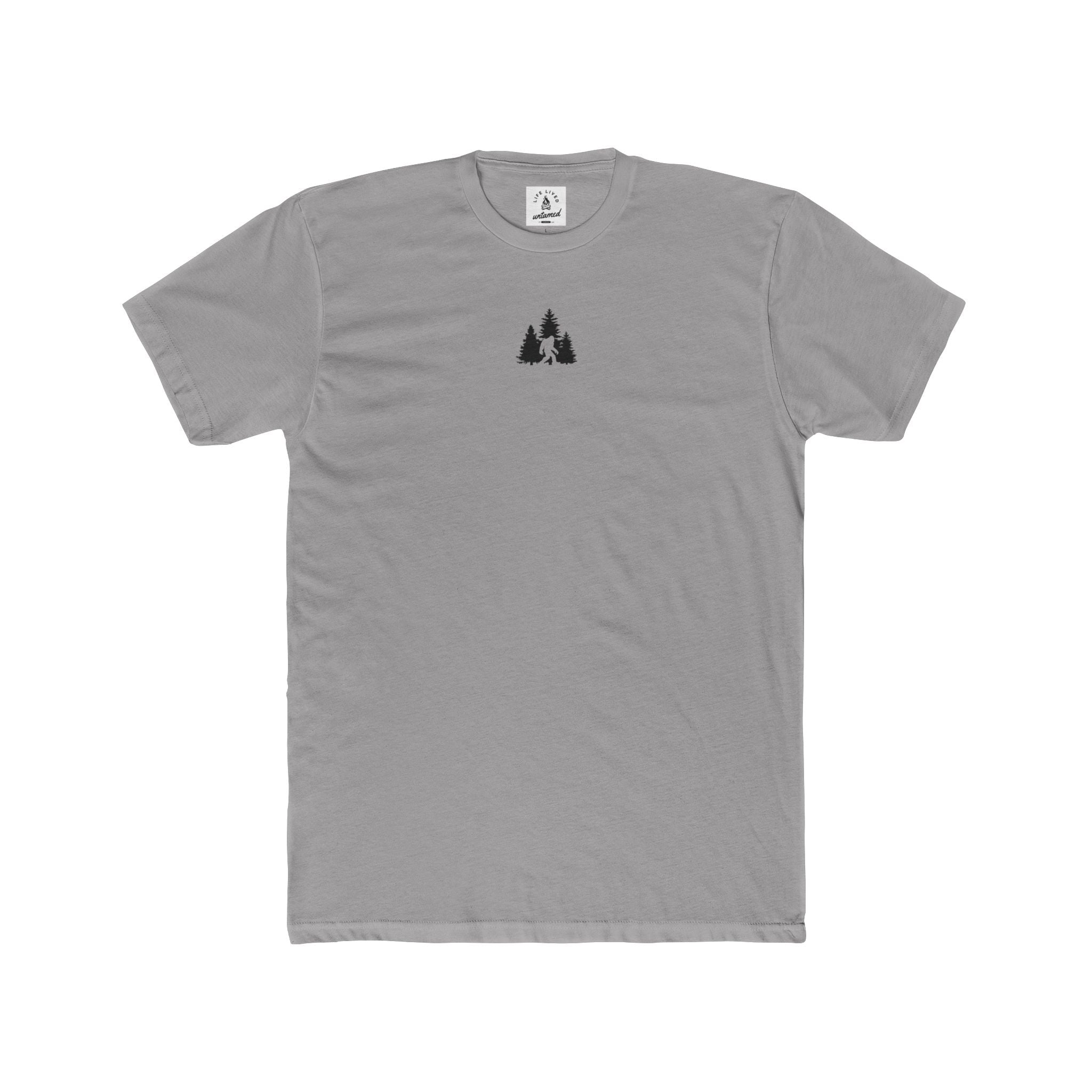 Gray t-shirt with a small sasquatch in wilderness graphic
