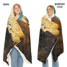 Two people wearing a textured blanket with 'Sherpa' and 'Microfiber Fleece' labels.