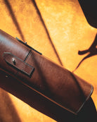 Brown leather tool-roll close up picture