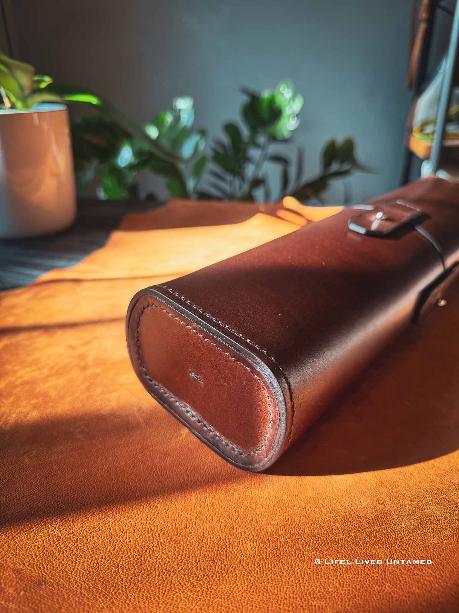Brown leather Tool-roll on a lamb skin showing texture of grain