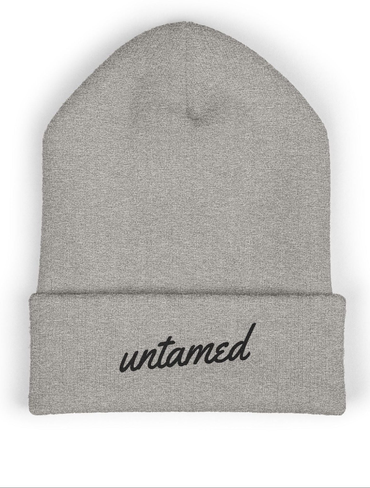 Heather gray beanie with 'untamed' text on a white background