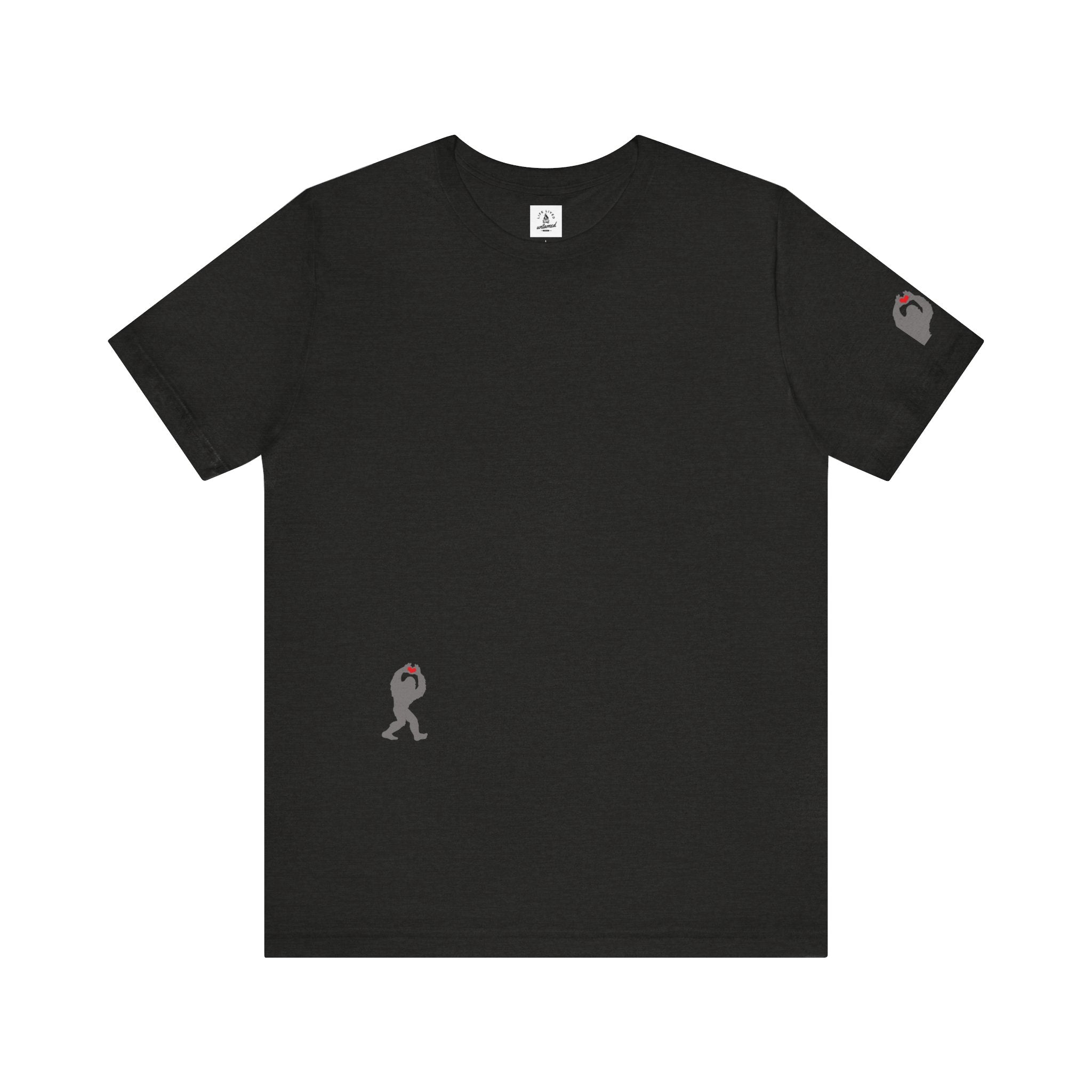 Women's dark gray heather t-shirt with small black Sasquatch graphic on lower front and a sleeve on a white background