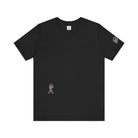 Women's black t-shirt with small gray Sasquatch graphic on lower front and a sleeve on a white background