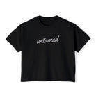 Women's 'Untamed' gray script graphic on solid black short-sleeve crewneck crop tee shirt