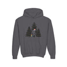 A gray hoodie with a graphic of the Sasquatch in a snowy landscape with trees on a white background.