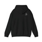 A black hoodie with a white ‘Lived Untamed' logo on the back with the hood down against a white background.