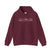 Maroon hoodie with white mountain, desert and wave graphics on a white background.