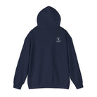 A navy blue hoodie with a ‘Lived Untamed' logo on the back with the hood up against a white background.