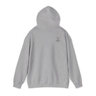 A Sport gray hoodie with a 'Life
Lived Untamed' logo on the back with the hood up against a white background.