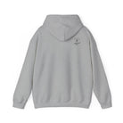 A Sport gray hoodie with a ‘Lived Untamed' logo on the back with the hood down against a white background.