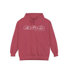 Crimson hoodie with ocean, mountain, and desert designs on a white background