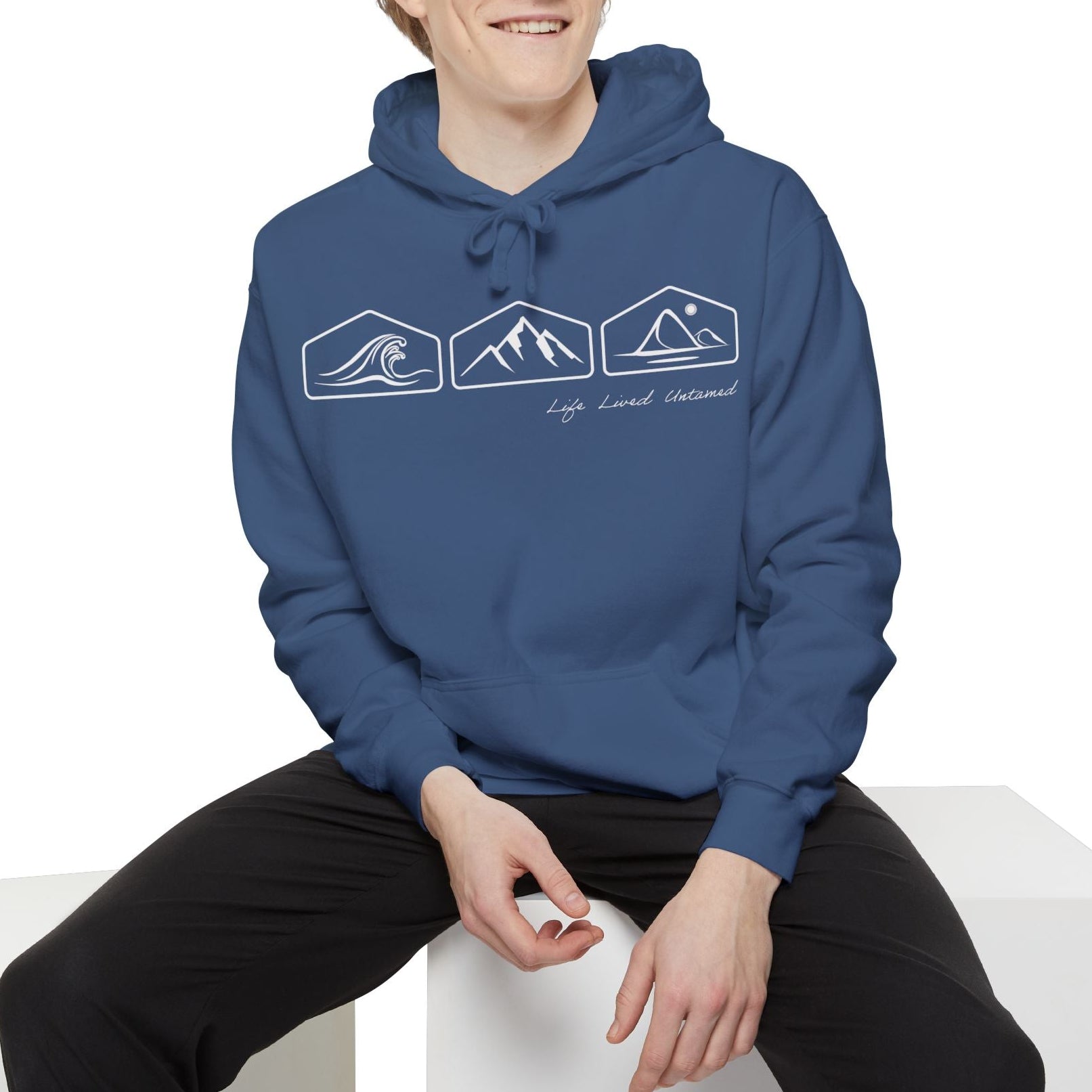 Person wearing a blue hoodie with XOG and text on a white background