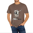 Man wearing a brown t-shirt with a cow graphic on a white background