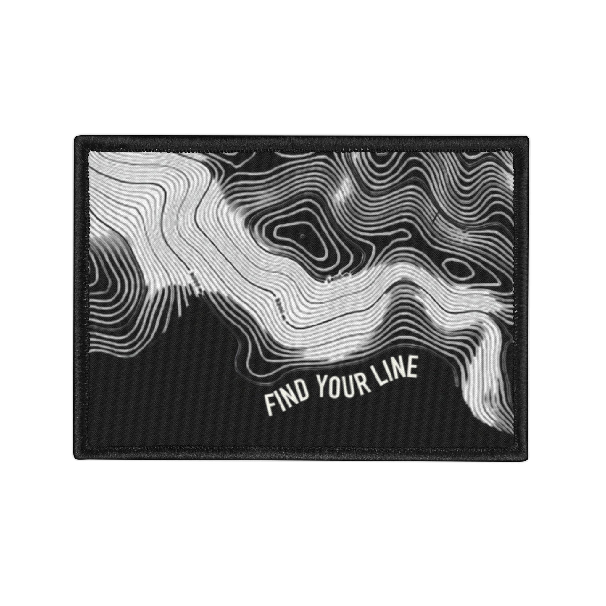Black and white topographic design patch with 'Find Your Line' text on a white background