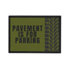 Patch with 'Pavement is for Parking' text and tire tread design on a green background