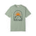 Bay green t-shirt with mountain and sun design on a white background