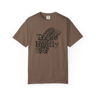 Brown t-shirt with 'Tread Lightly' graphic on a white background