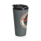 Gray travel mug with black lid featuring a part of graphic on a white background