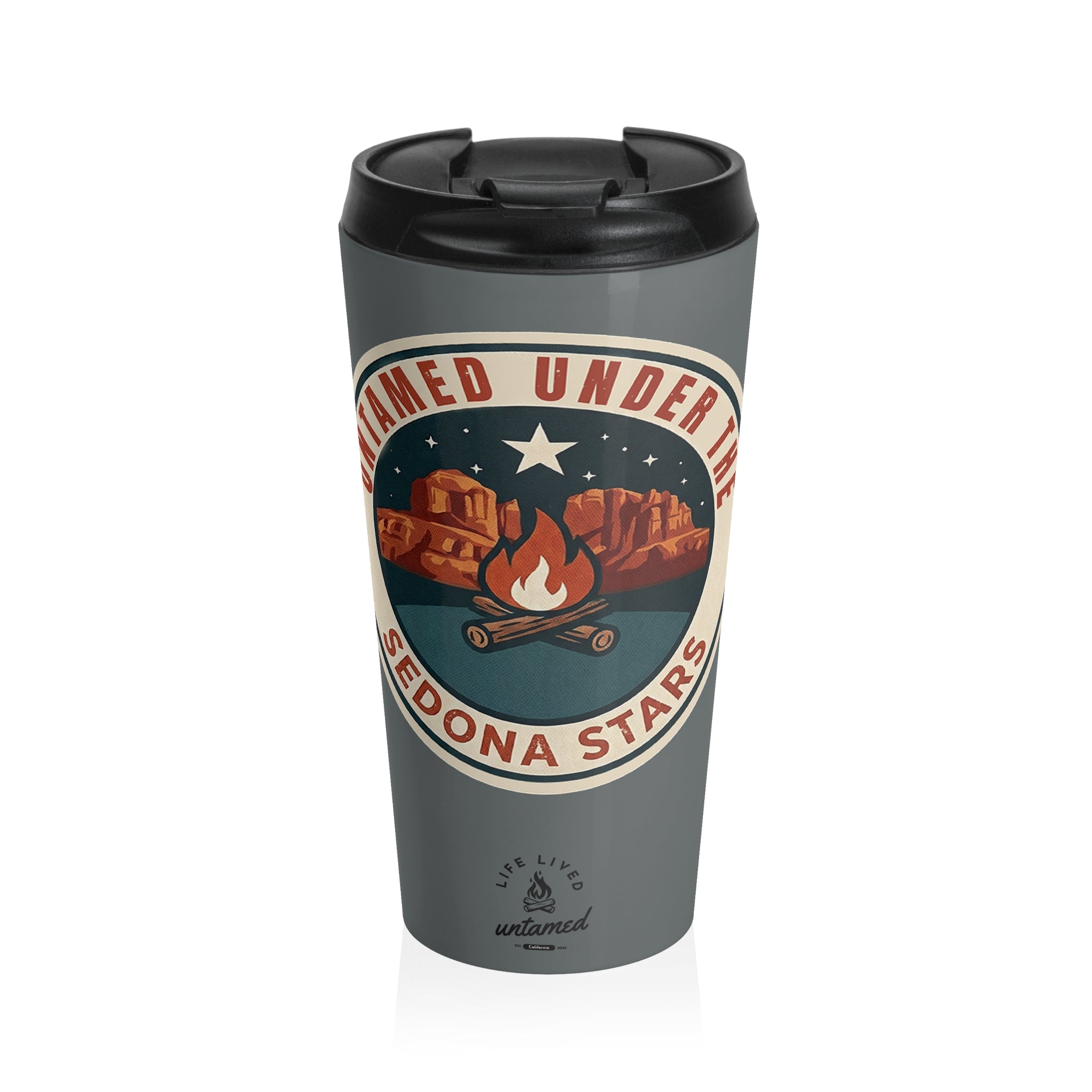 Gray travel mug with a graphic design featuring a star, mountains, and a campfire on a white background.