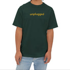 A men wearing Unisex forest green Unplug Yourself Boxy Tee made from soft Airlume cotton, perfect for outdoor adventure.